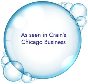 A bubble with the words " as seen in crains chicago business."